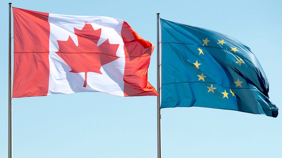 Die Flaggen Kanadas und der Europäischen Union wehen in Berlin. Foto: Picture Alliance/DPA