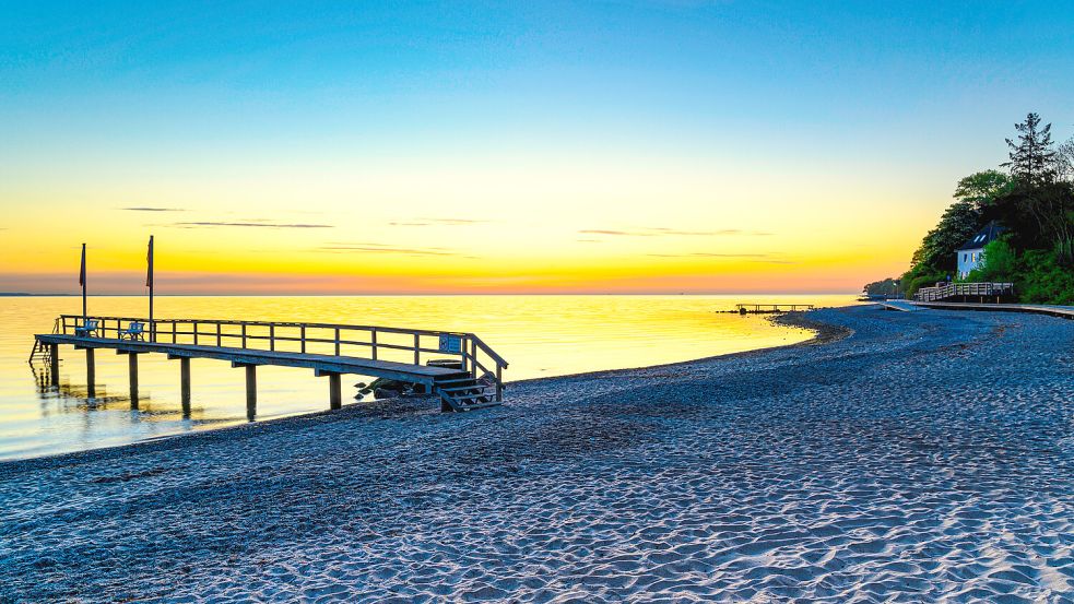 Sehr beliebtes Urlaubsziel: Sonnenuntergang am Timmendorfer Strand an der Ostsee. Foto: IMAGO/Panthermedia